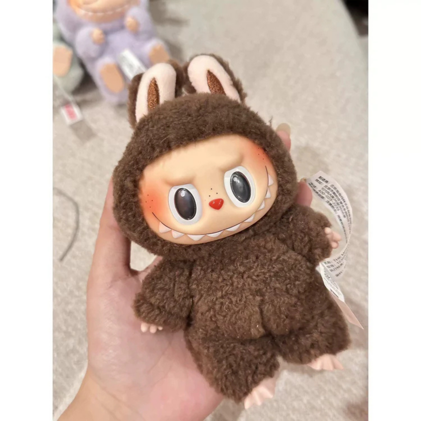 POP MART Labubu “Chestnut Cocoa” Secret Edition Plush Keychain – The Monsters Series Vol. 1 (Exciting Macarons)